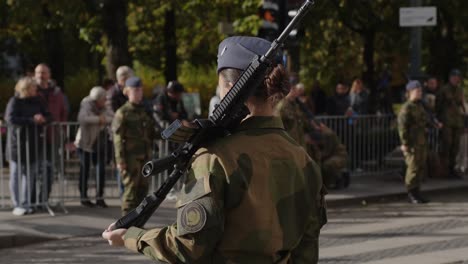 Female-soldier-standing-on-Karl-Johan-during-military-parade