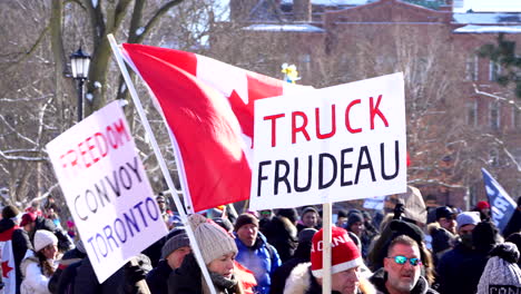 Crowds-Protesting-with-anti-Covid-Mandate-Posters-in-Toronto