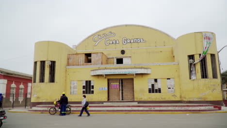 Transportation-and-People-Outside-the-Casa-Grande,-Ascope,-La-Libertad,-Peru