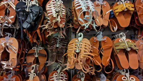 Shoes-and-sandals-for-sell-in-the-old-market-in-Athens,-Greece