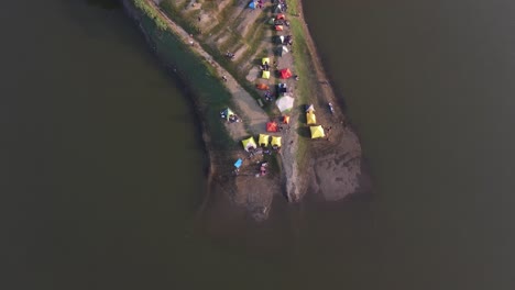 Aerial-view,-a-very-beautiful-campsite-on-the-edge-of-the-Sermo-reservoir,-Kulon-Progo,-Yogayakarta