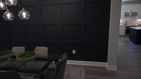 modern-lighting-and-paneled-textured-black-wall-in-a-ultra-modern-sleek-designer-dining-room