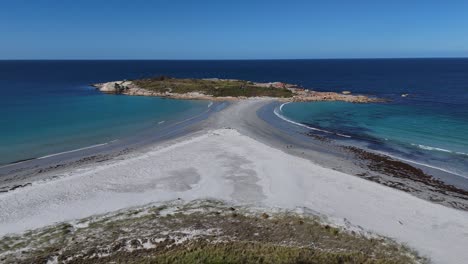 Descending-towards-Diamond-Island-with-sandbar-towards-beach,-aerial-shot