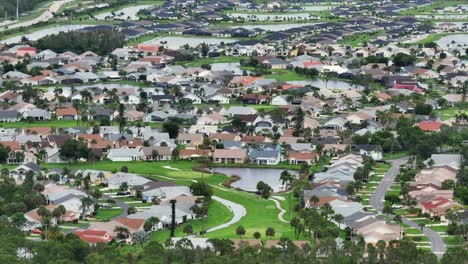 Residential-community-with-winding-streets-and-green-spaces-in-The-Villages,-Florida