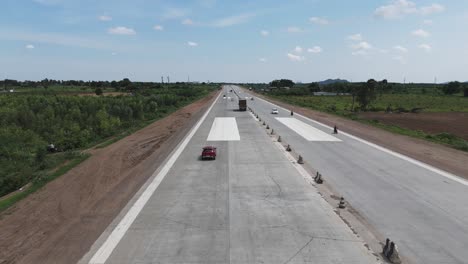 A-cinematic-aerial-video-captures-a-highway-with-the-sight-of-an-emergency-landing-runway-constructed-on-NH-16-at-Pichukalagudipadu-village-in-the-Korisapadu-area-of-the-Chennai-Vijayawada-expressway