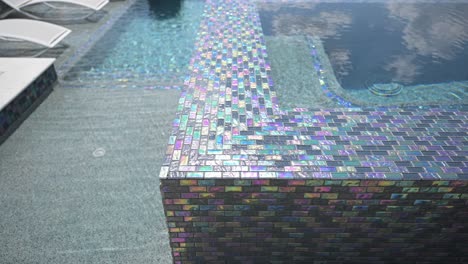 beautiful-luxury-outdoor-spa-and-zero-entry-pool-with-iridescent-outdoor-tile