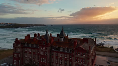 Aerial-drone-shot-over-the-Headland-hotel-located-on-Cornwall's-idyllic-coastline