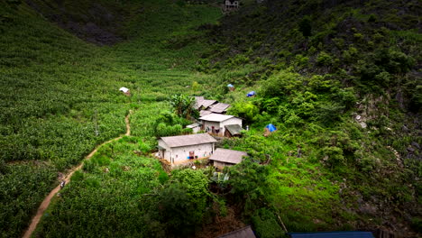 Aerial-view-of-remote-traditional-houses-in-mountainous-Northern-Vietnam