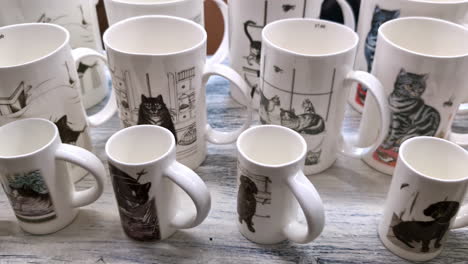 Cat-and-dogs-mug-design,-original-art-and-craft-shop-on-display,-animal-motif