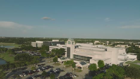 A-half-orbit-aerial-4K-drone-view-of-Memorial-Hermann-Hospital-Southeast-at-late-evening-in-Houston,-Texas