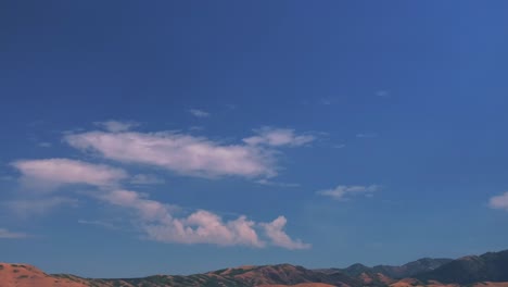 Downtown-Salt-Lake-City-SLC-Utah-USA-Wasatch-Mountain-Range-aerial-drone-summer-blue-sky-morning-afternoon-LDS-temple-The-Great-Salt-Basin-Lake-County-region-office-buildings-opening-scene-pan-down-up