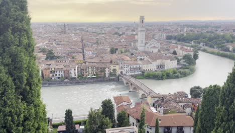 View-overlooking-Verona,-river-and-Ponte-Petra-at-sunset-from-Saint-Peter's-Hill