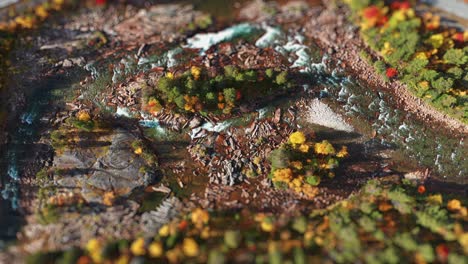 A-scaled-down-view-of-the-turbulent-mountain-river-runs-through-a-rocky-landscape