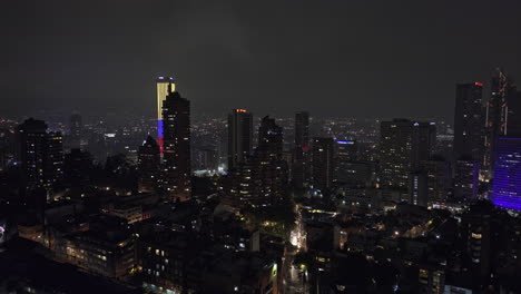 Bogota-Colombia-Aerial-v36-drone-flyover-International-Center-capturing-downtown-cityscape-and-Carrera-10-across-Alameda-and-Santa-Fe-neighborhoods-at-night---Shot-with-Mavic-3-Cine---Nov-23rd-2022