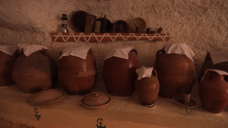 Clay-jars-and-baskets-line-the-shelves-inside-an-ancient-Ksar-house-in-Tunisia