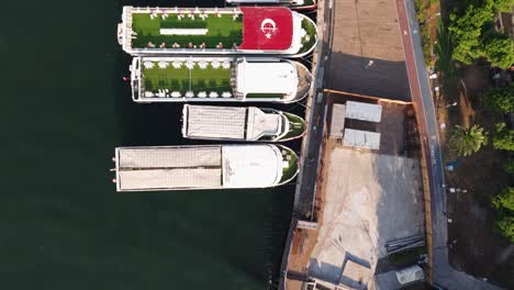 Top-Down-Aerial-View-of-Ferry-Boats-in-Istanbul,-Turkish-Capital-City