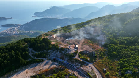 Aerial-tracking-shot-of-nature-burning-in-the-highlands-of-Budva,-Montenegro