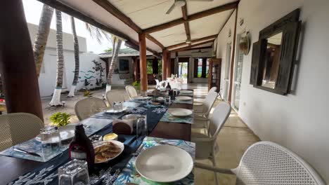 Caribbean-Charm-breakfast-table-set-Al-Fresco,-colonial-beach-house,-Los-Roques-Venezuela