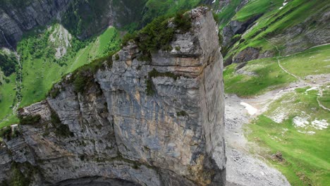 4k-Drone-Aerial-Shot-Of-Massive-Rock-Structure-At-Shäfler-Ridge-In-Appenzell-Region-Of-Switzerland