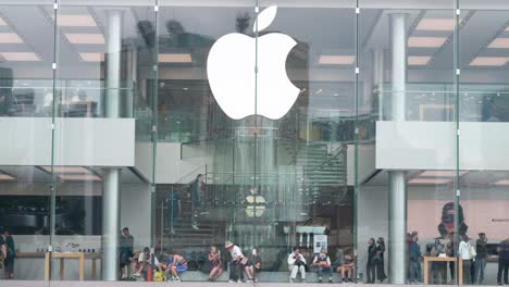 A-wide-shot-captures-customers-shopping-at-the-Apple-Store,-the-American-technology-company,-in-Hong-Kong