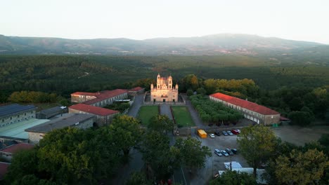 Aerial-View-Of-Beautiful-Milagros-Temple-And-Gardens-On-Summer-Sunset