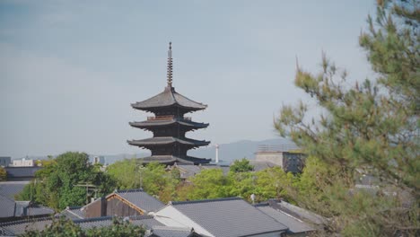 Beautiful-morning-view-of-Tō-ji-Temple-in-Kyoto,-Japan,-surrounded-by-lush-greenery-and-traditional-architecture,-capturing-the-serene-atmosphere-and-cultural-heritage-of-this-iconic-landmark