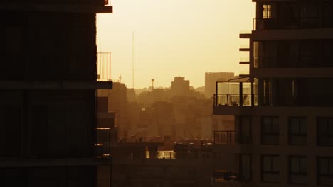 Golden-hour-in-Buenos-Aires-cityscape-framed-by-high-rise-buildings-in-warm-sunset-light