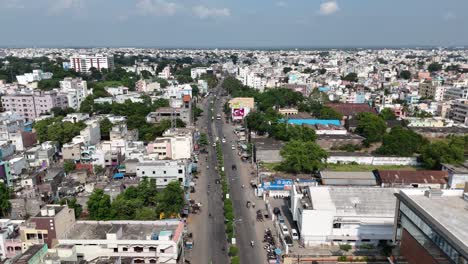 Drone-shot-of-the-evolving-cityscape-of-Vijayawada,-with-both-modern-and-traditional-elements