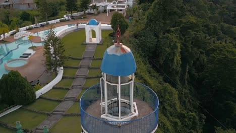 Close-aerial-circular-motion-near-lighthouse-at-Tierra-Alta-Residential-Resort