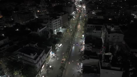 Wide-angle-drone-night-view-of-rural-landscapes-with-a-road-stretching-through-open-plains