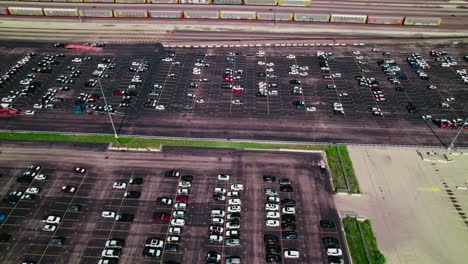 Aerial-footage-of-a-huge-car-transport-company-parking-lot-near-Chicago