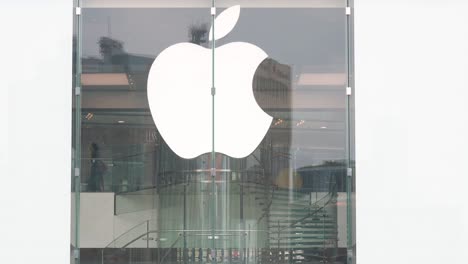 A-look-at-the-Apple-Store,-the-iconic-American-tech-giant,-with-its-logo-prominently-featured