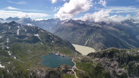 Mountains-skyline-Swiss-Alps-nature-lake-landscape,-aerial-Switzerland