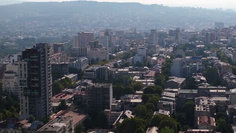 Aerial-View-of-Skyscrapers-in-Tbilisi,-Georgia-on-Typical-Summer-Day