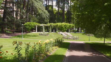 Profile-view-of-Parc-floral-des-thermes-in-Aix-les-Bains,-France-during-daytime