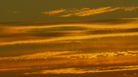 Establishing-Shot-of-Impressive-Sunset-Golden-Hour-Natural-Layered-Clouds-in-France,-Europe-4K