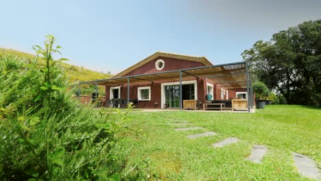 Slow-establishing-shot-of-a-countryside-cabin-house-in-St-Colombe