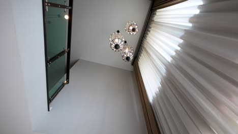 The-Luxurious-Crystal-Chandelier-is-Hanging-on-the-High-Ceiling