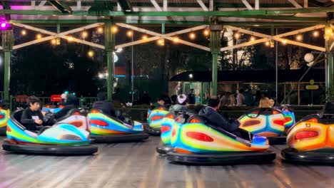 Bumper-car-games-with-a-group-of-people-enjoying-family-moments-at-the-Fantasilandia-park,-Santiago,-Chile