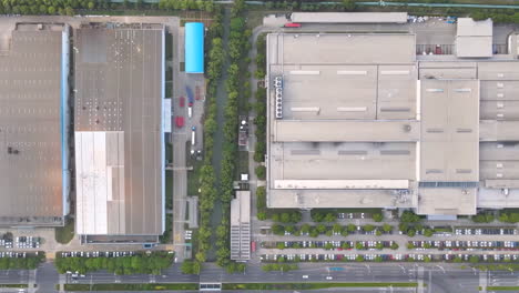 Overhead-shot-of-industrial-Big-factory-warehouse-rooftop