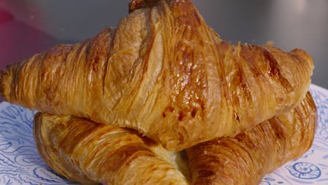 Delicious-Freshly-Baked-Butter-French-Croissants-Outside-in-Early-Morning-Light-Ready-to-Eat