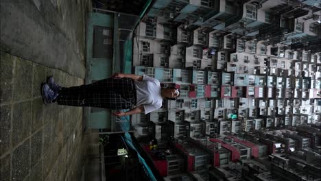 Isolated-caucasian-woman-admiring-Yick-Cheong-Building-in-Hong-Kong