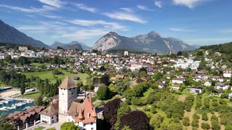 Backward-view-of-Spiez-Church-and-Castle-on-the-shore-of-Lake-Thun-in-the-canton-of-Bern,-Switzerland