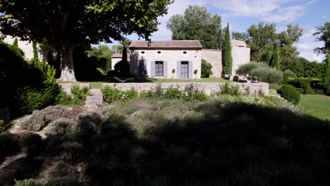 Aerial-establishing-shot-of-a-small-stepped-garden-at-a-villa-in-France