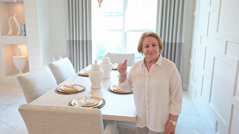 female-customer-pleased-with-her-new-marble-tiling-and-incredible-dining-room-delivery-and-installation