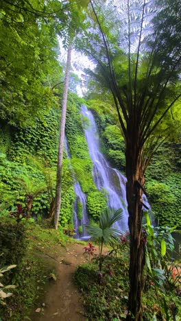 Vertical-View-of-Stunning-Waterfall-in-Tropical-Paradise-of-Bali-Island,-Indonesia