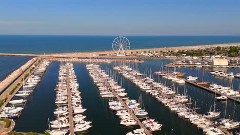 Experience-the-breathtaking-beauty-of-Rimini’s-beaches-through-stunning-drone-footage,-showcasing-golden-sands-and-sparkling-turquoise-waters-along-the-Adriatic-coast