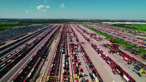 Bird's-eye-view-of-a-rail-terminal-with-containers-and-loading-cranes