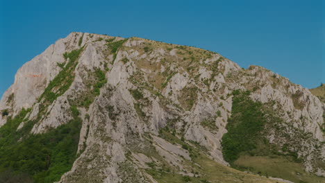 Rocky-Mountains-Over-Hungarian-Village-Rimetea-In-Romania