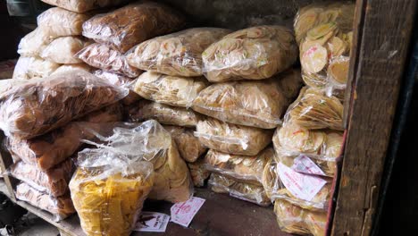 View-of-plastic-bags-filled-with-raw-krupuk-in-Surabaya,-Sidoarjo,-Indonesia,-used-for-sand-production-snacks